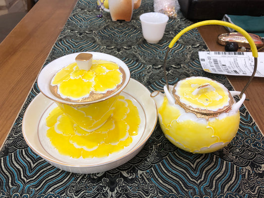 Yellow covered bowl